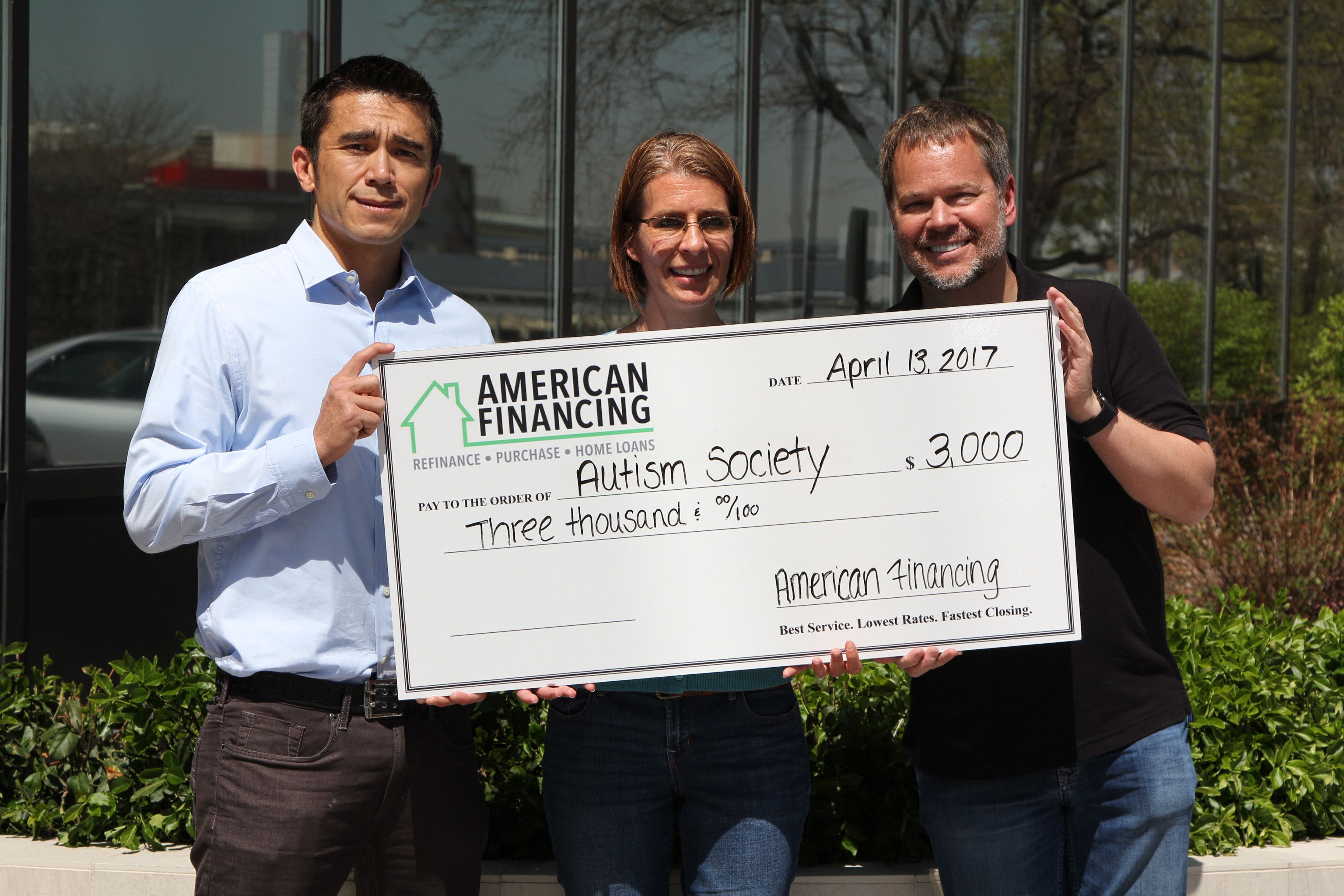 AFC employee donating to the Autism Society of Colorado
