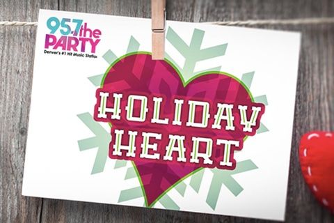 95.7 the Party Holiday Heart charity sign