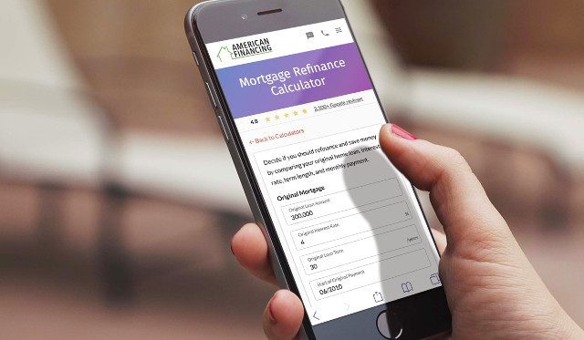 Person using mobile refinance calculator