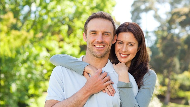Happy couple in backyard