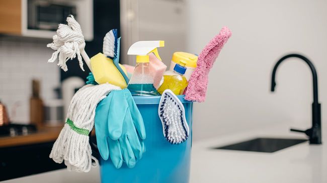 House cleaning supplies in bucket
