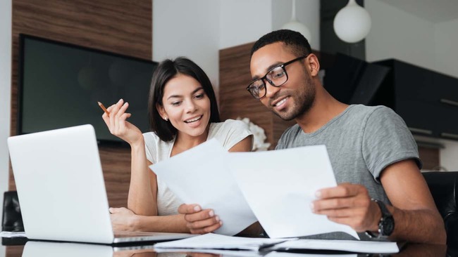 Couple looking over paperwork