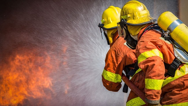 Firefighters putting out fire