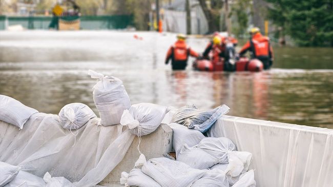 Flooded street of homes after natural disaster