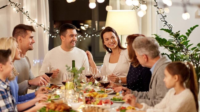 Family enjoying holiday dinner at home