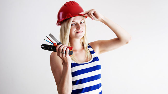Woman repairing home