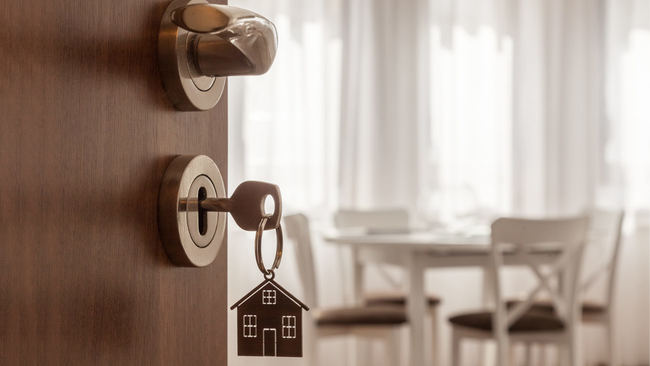 Locking the door of a home