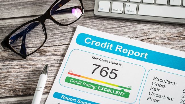 Credit report on desk with 765 score