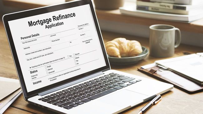 Mortgage refinancing application on laptop screen