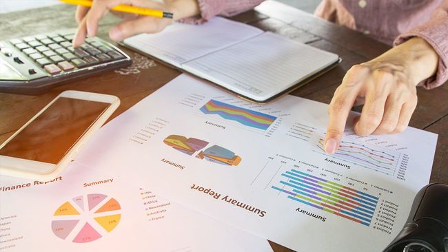 Woman reviewing mortgage summary report