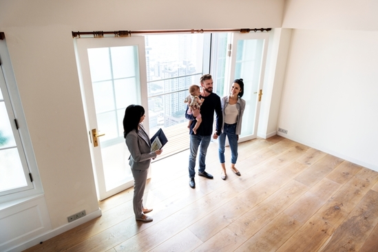 Couple touring home at inspection