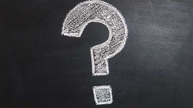 Question mark on a blackboard
