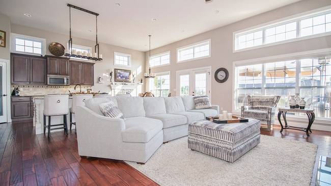 Staged living room and kitchen area