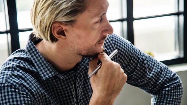 Man thinking about value of home